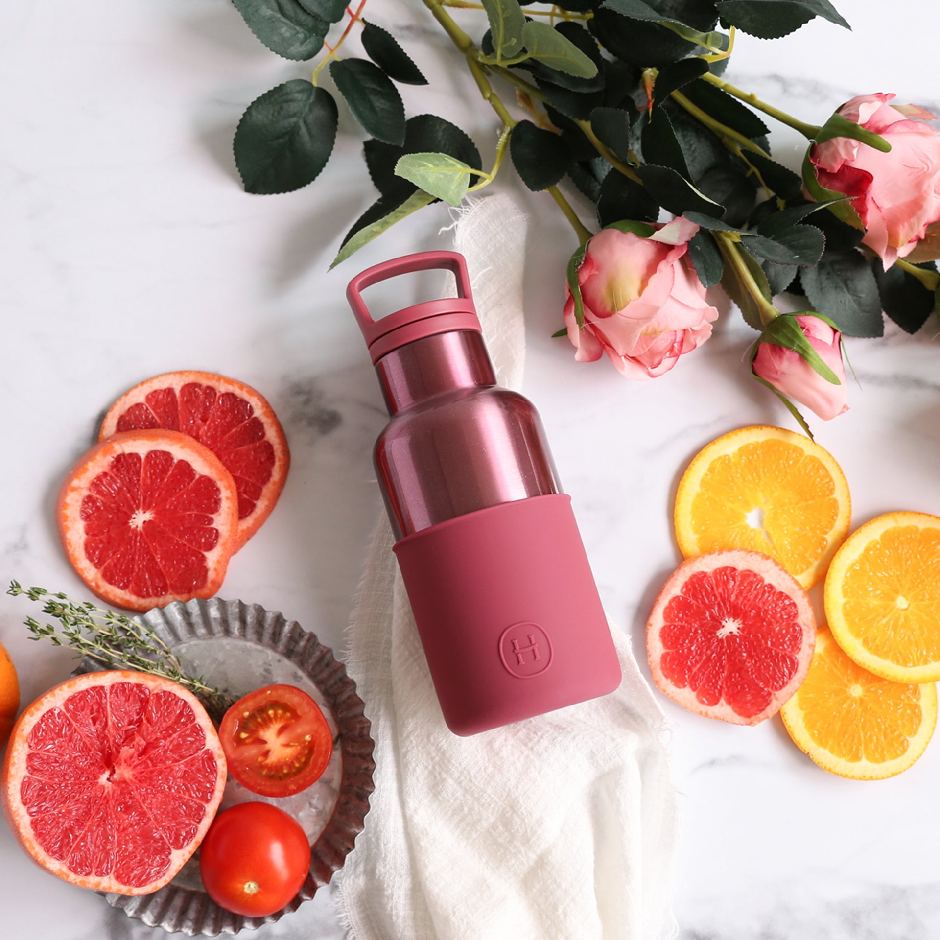 HYDY rose gold and wine red 12 oz bottle, sleek design with metallic finish, ideal for beverages or decorative use