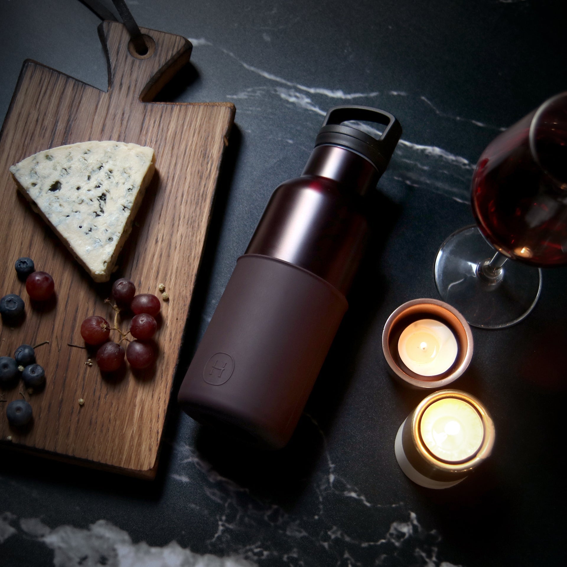 HYDY Burgundy-Black Cherry 16 oz bottle showing the dark red and black cherry flavor label and sleek glass design.