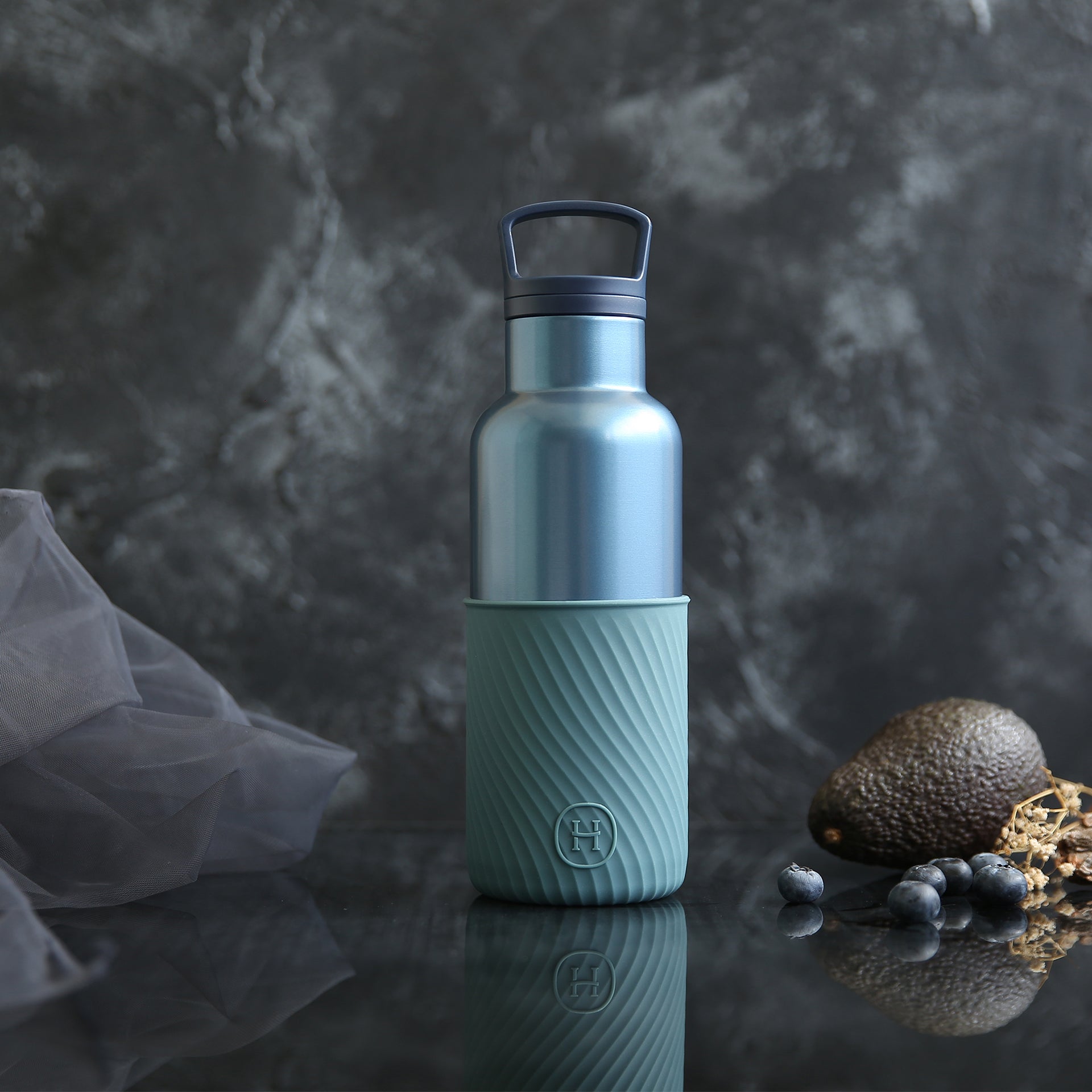 HYDY Sapphire-Adriatico 16 oz bottle with sleek design and clear glass showcasing the premium beverage inside.