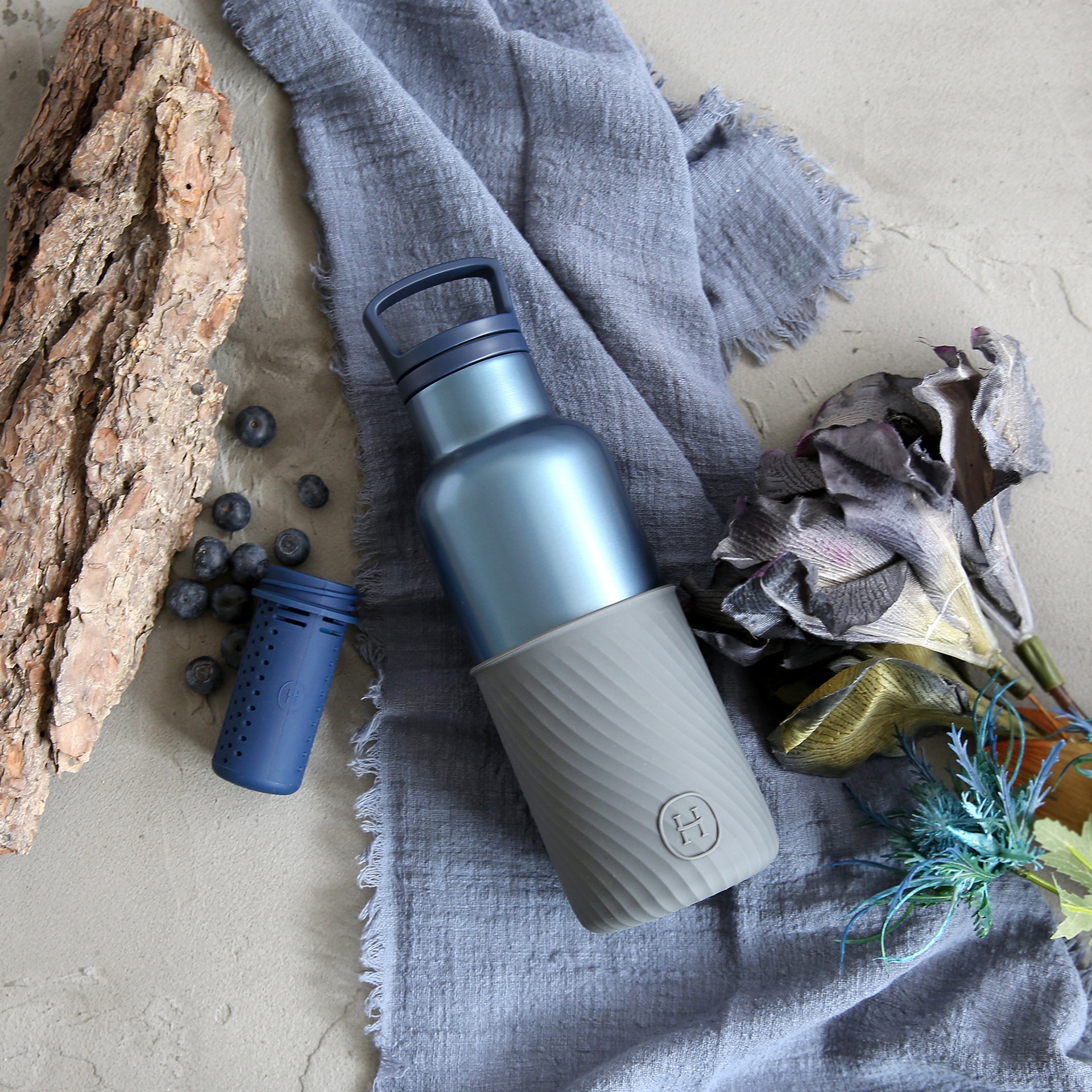 HYDY Sapphire metallic grey 16 oz bottle with a sleek design, made of durable material and featuring a secure cap.