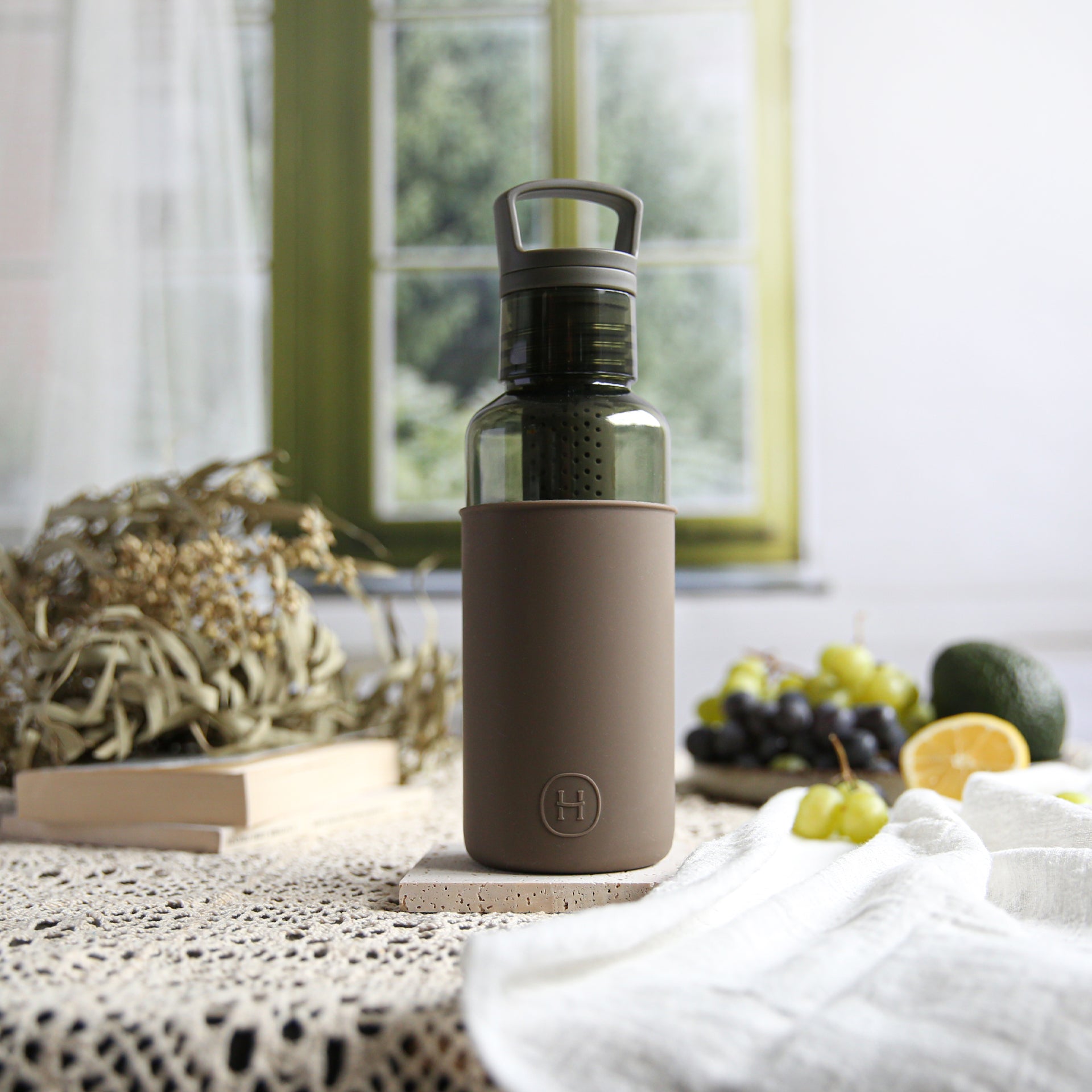 Forest green HYDY Wild 20 oz bottle with a sleek design and durable construction, ideal for staying hydrated on the go.