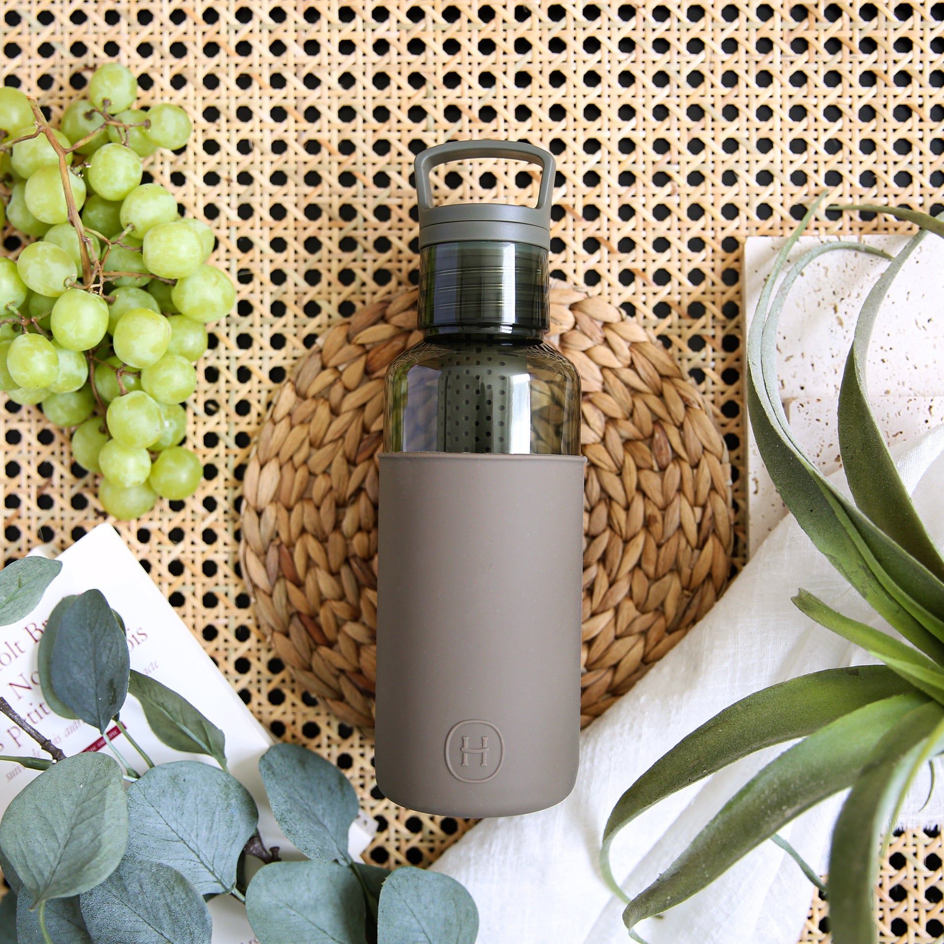 Forest green HYDY Wild 20 oz bottle with a sleek design and sturdy cap, ideal for hydration on the go.
