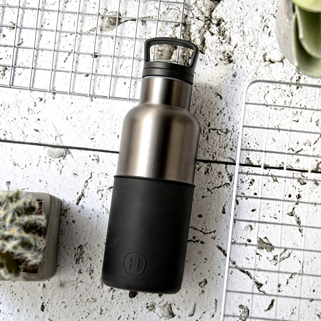 HYDY 16 oz titanium grey and ink black bottle, durable container with secure lid for liquids or ink storage.