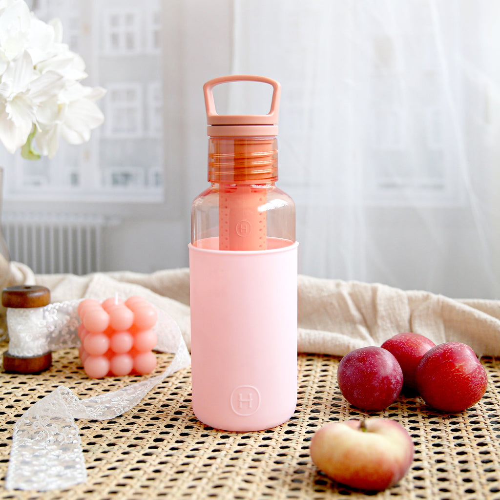 HYDY Peachy orange cherry blossoms 20 oz bottle with vibrant cherry blossom design and clear plastic body.