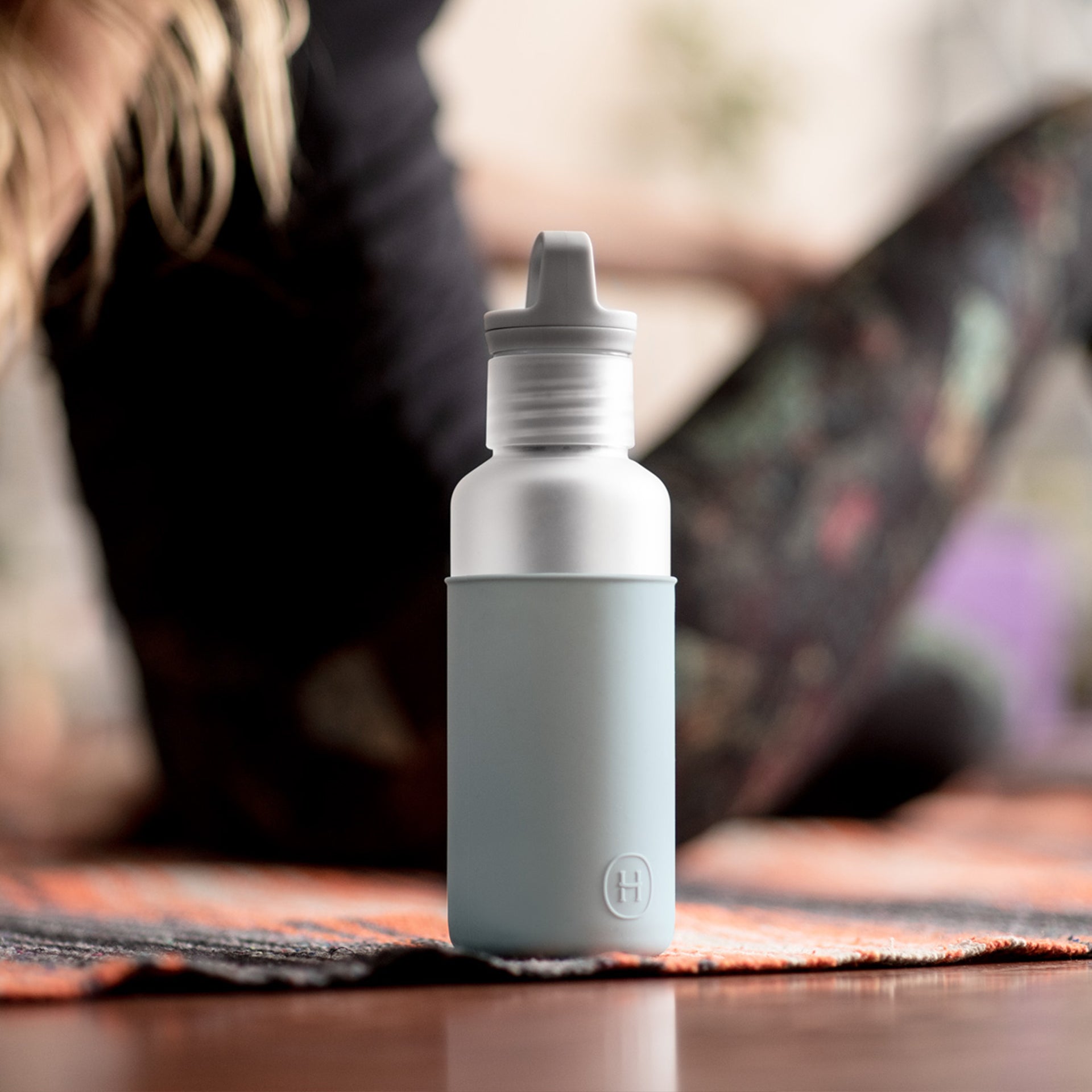 HYDY Misty-Cumulus 20 oz water bottle with a sleek design and secure lid, perfect for staying hydrated on the go.