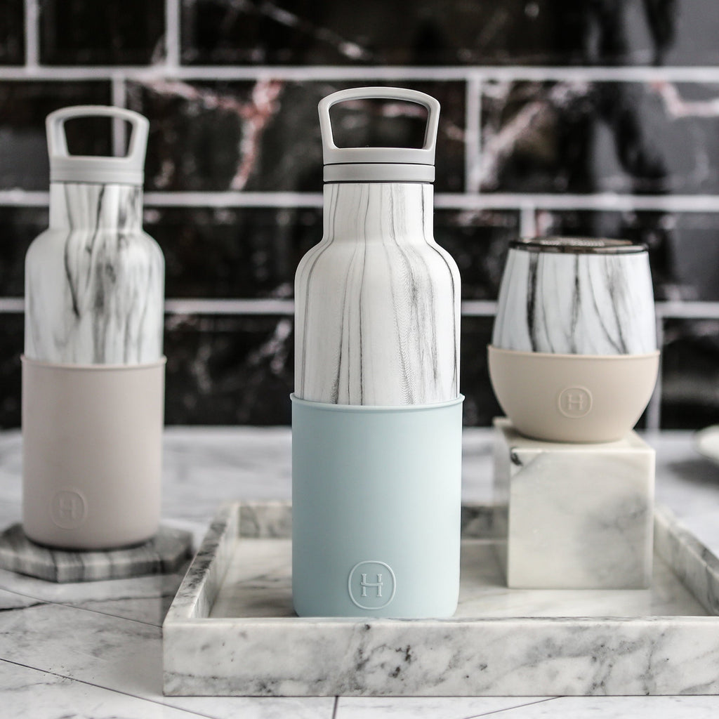 White marble HYDY Cumulus 16 oz water bottle with a sleek marble design and durable construction, ideal for everyday use.