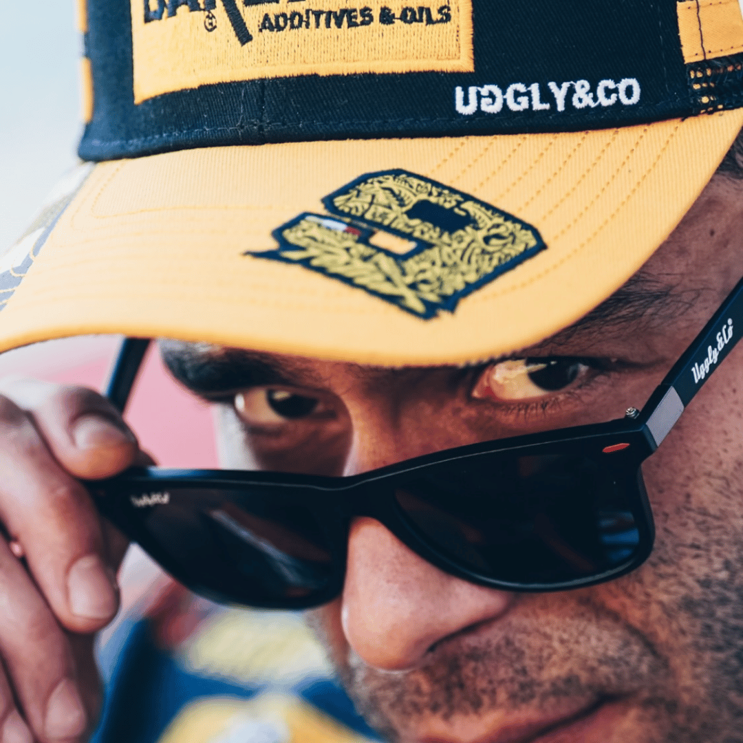 Bardahl and Danilo Petrucci branded trucker hat with mesh back and curved brim, in a stylish casual design.