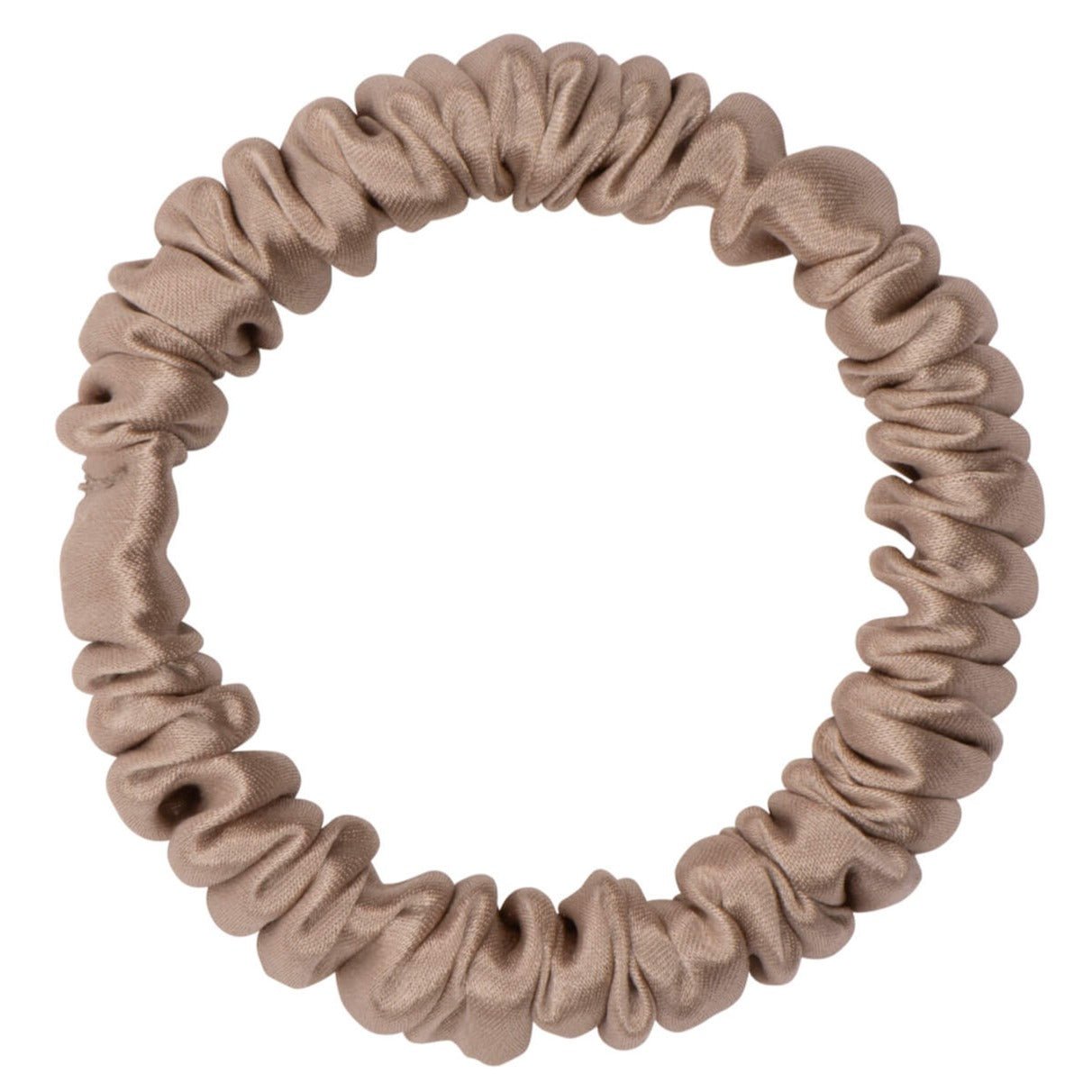 Light tan silk scrunchie by DREAMSILK, skinny style, shown in beige fabric with smooth, shiny silk texture.
