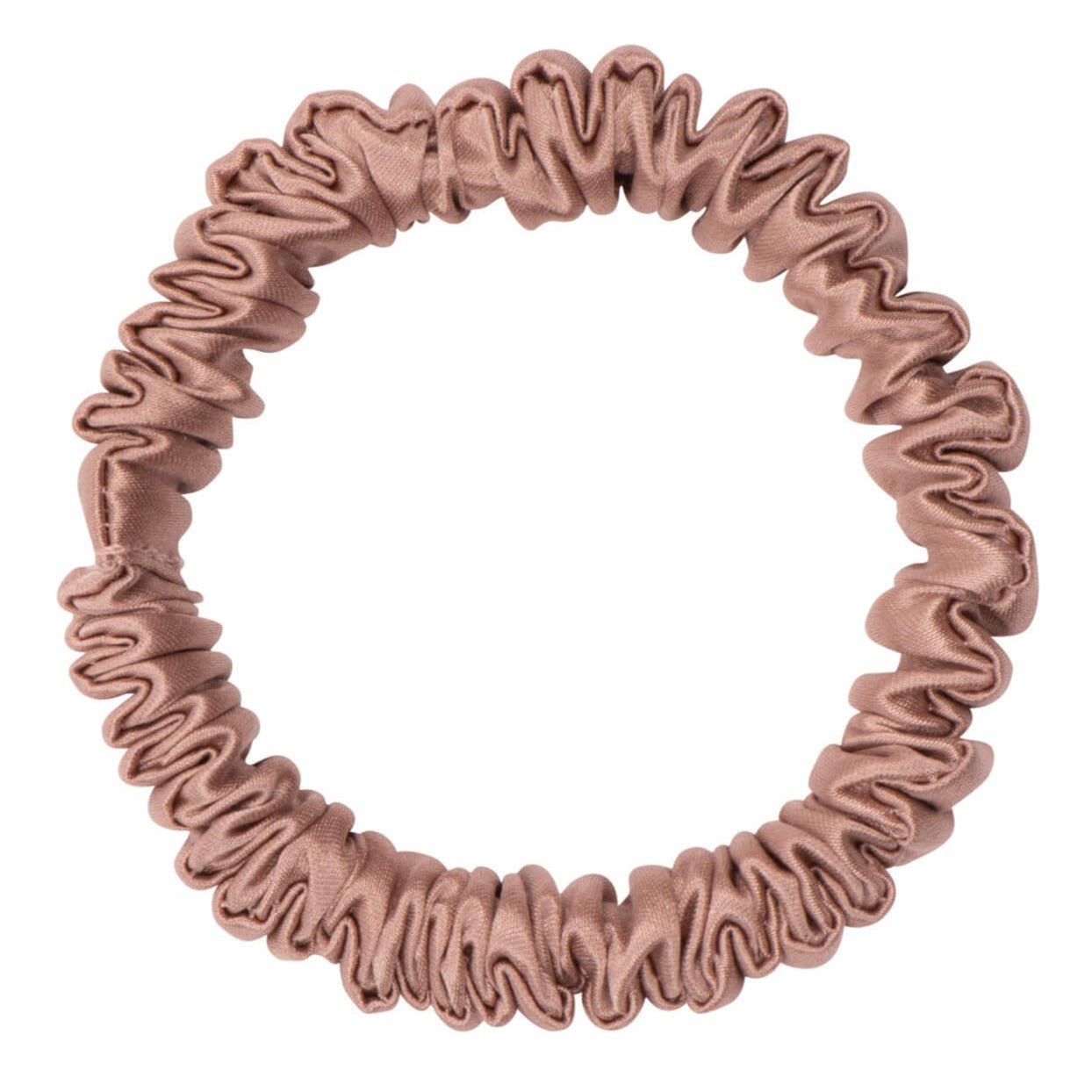 Bronze silk scrunchie by DREAMSILK, skinny style, made of smooth, shiny silk fabric, shown coiled on a white background.