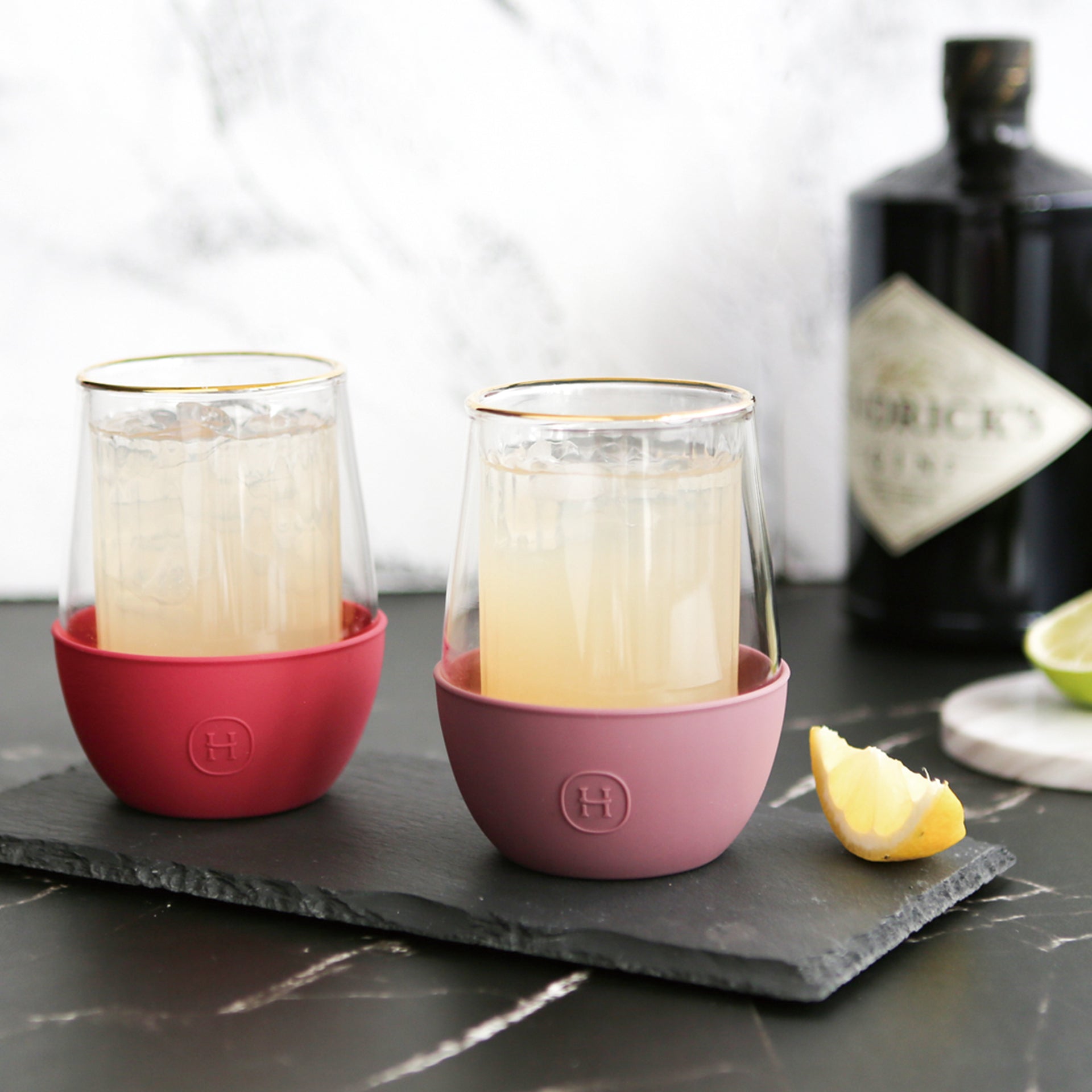 HYDY glass with dusty rose and stripe design, 8 oz capacity, showcasing a stylish and decorative beverage container.