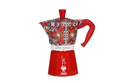 Bialetti Sicilian Cart Moka Express coffee maker featuring Dolce&Gabbana design, black and gold details, and compact shape.