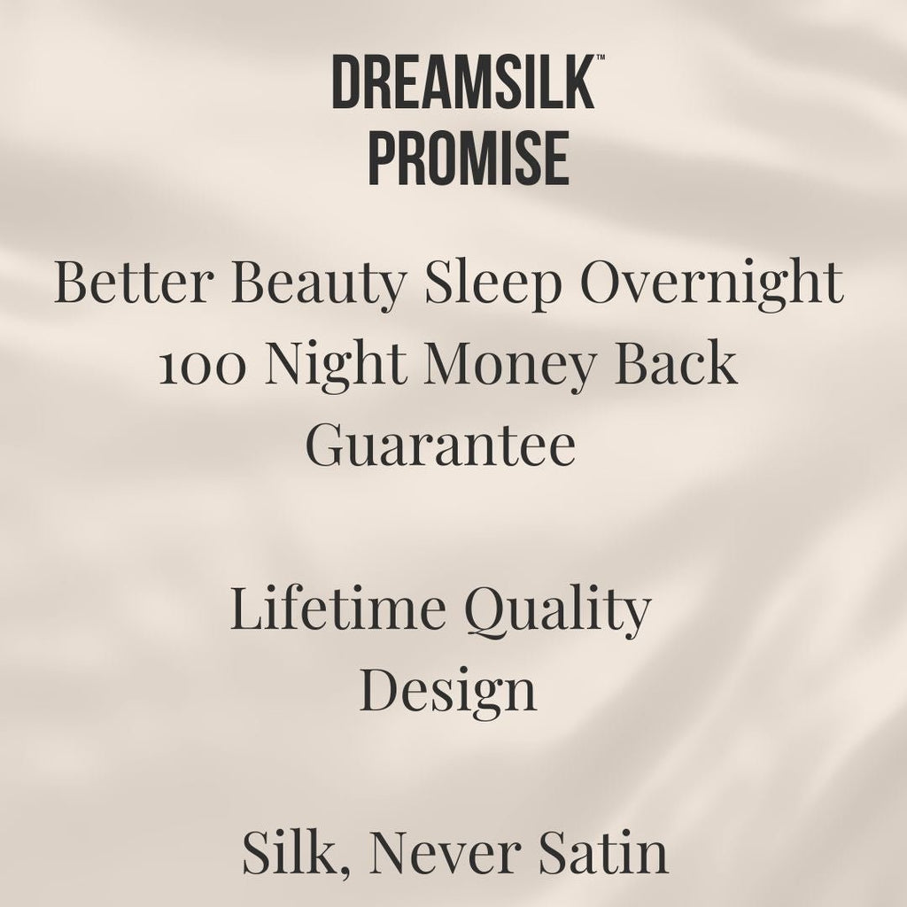 Navy blue silk pillowcase from DREAMSILK, standard size, smooth and luxurious fabric with a soft sheen.