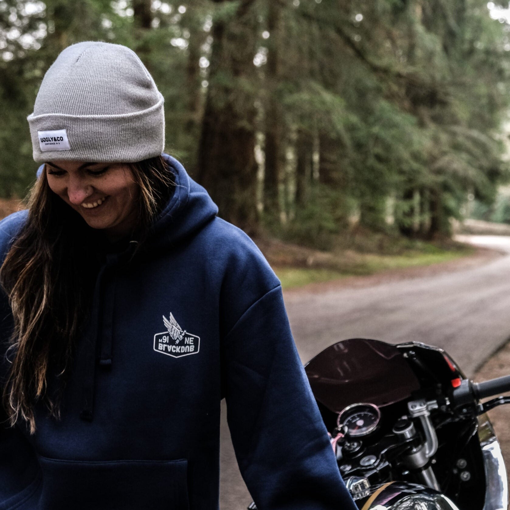 Grey Uggly and Co beanie hat with a snug, knitted design, perfect for cold weather and casual winter style.