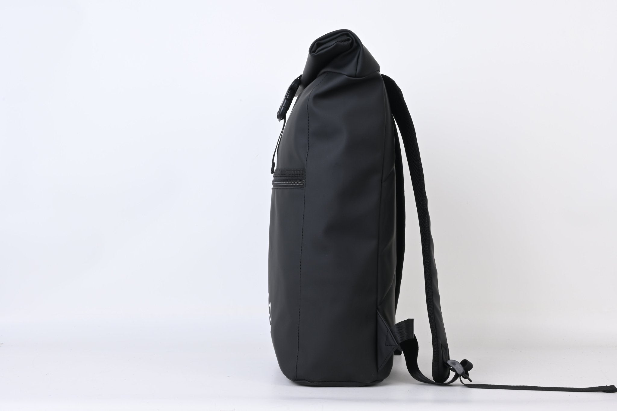 North Peak Blaze Backpack with multiple compartments and adjustable straps, shown in a sleek black design.