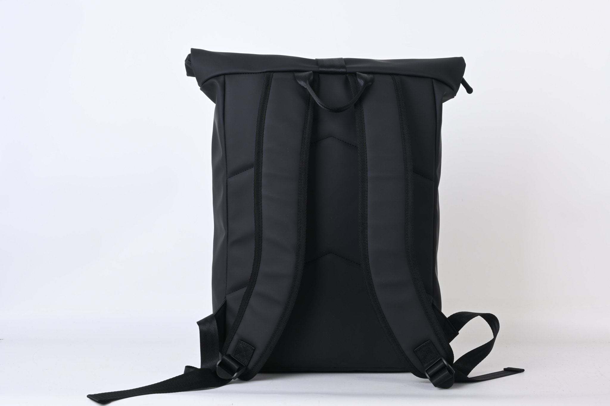 North Peak Blaze backpack with multiple compartments and padded straps, shown in black with silver accents.