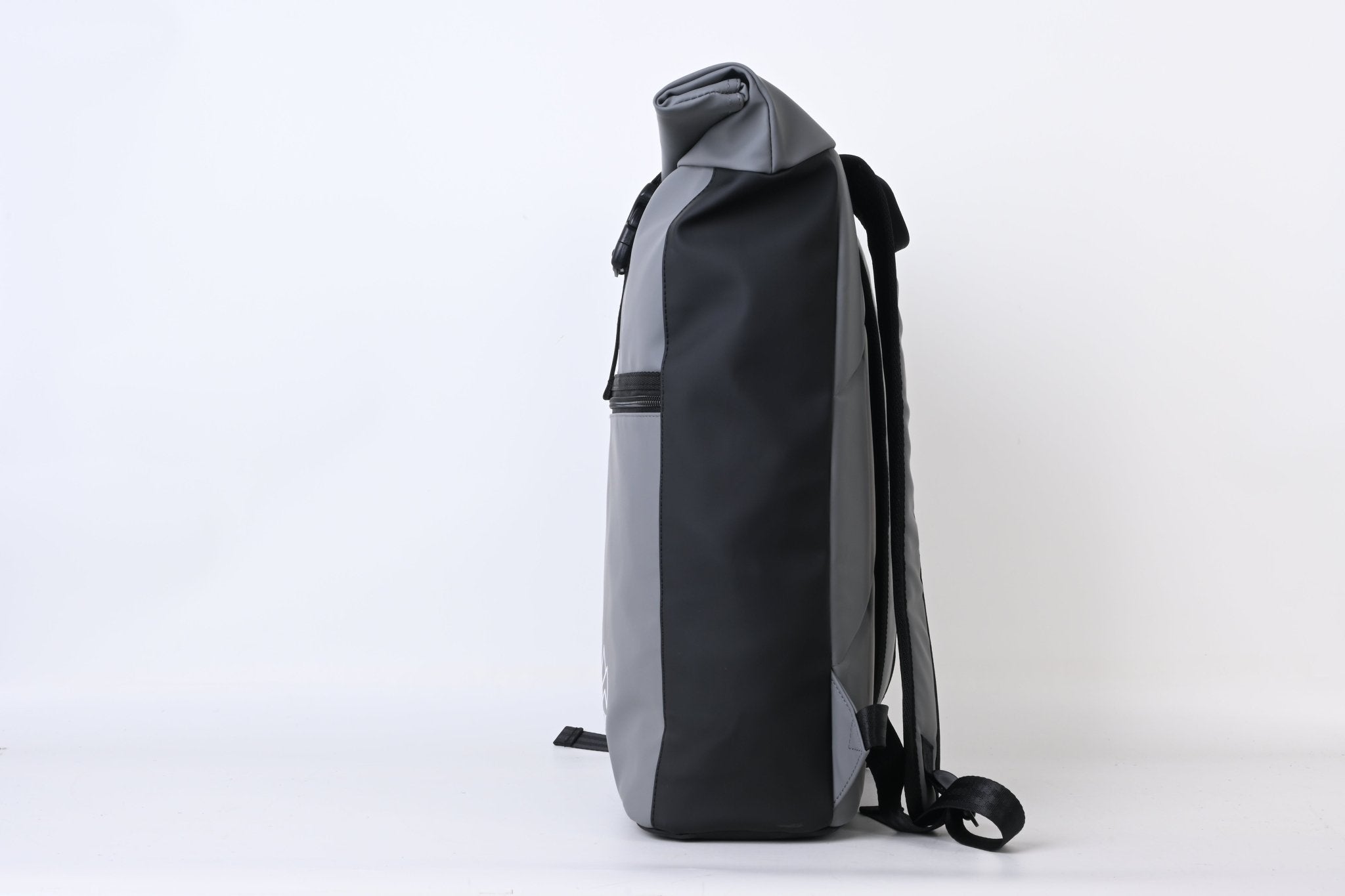 North Peak Blaze Backpack with multiple compartments and padded straps, shown on a model in an outdoor setting.