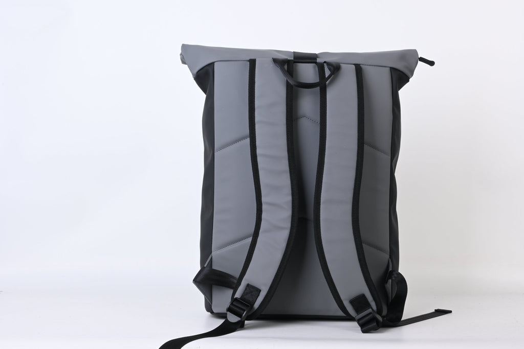 North Peak Blaze backpack with multiple compartments and padded shoulder straps, shown in a neutral color.