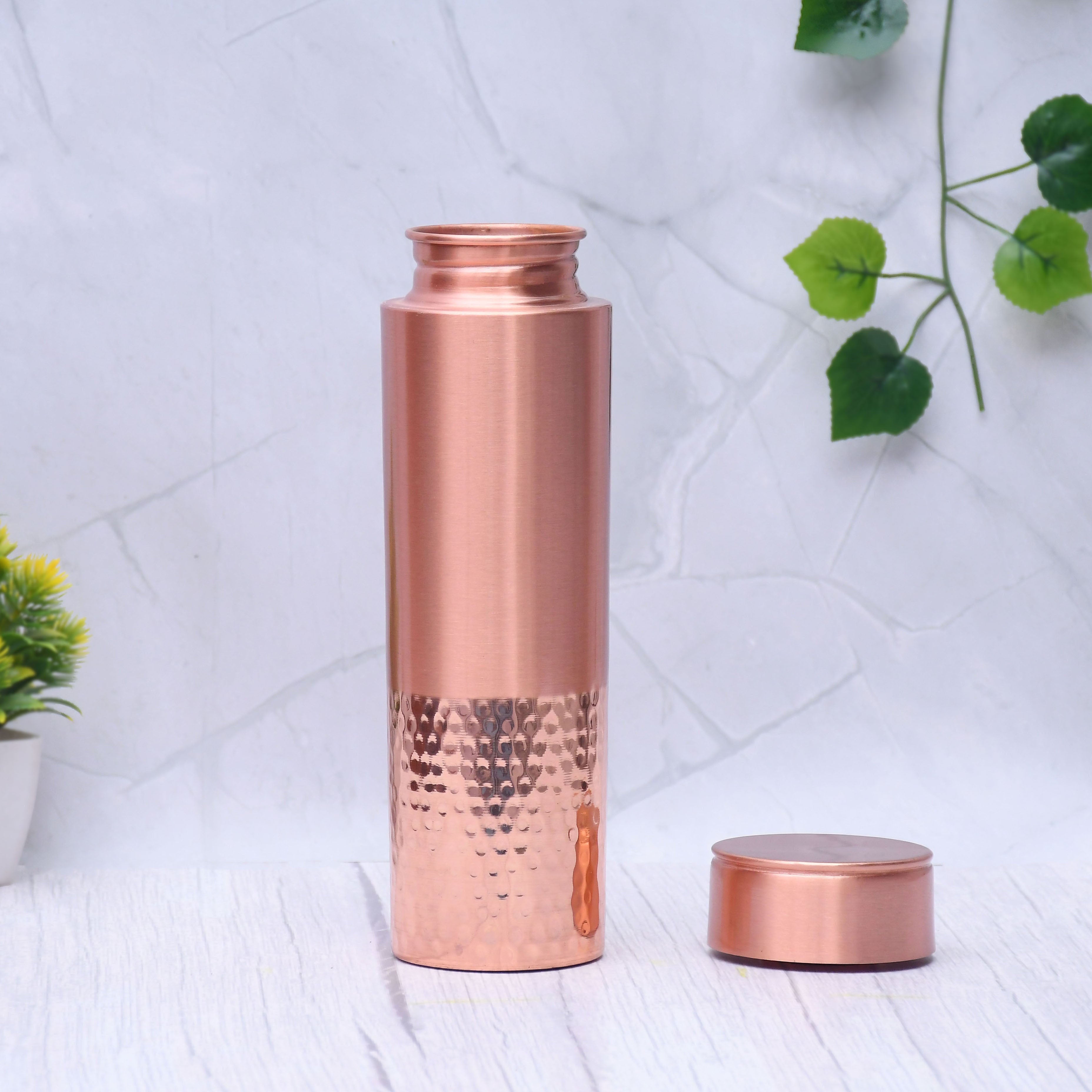 Pure copper water bottle by SAMA Homes, half hammered and half matte finish, 1000ML capacity, showcasing the unique design.