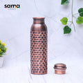 Pure copper antique water bottle with brick design, 1000ML capacity, by SAMA Homes, featuring an elegant vintage style.