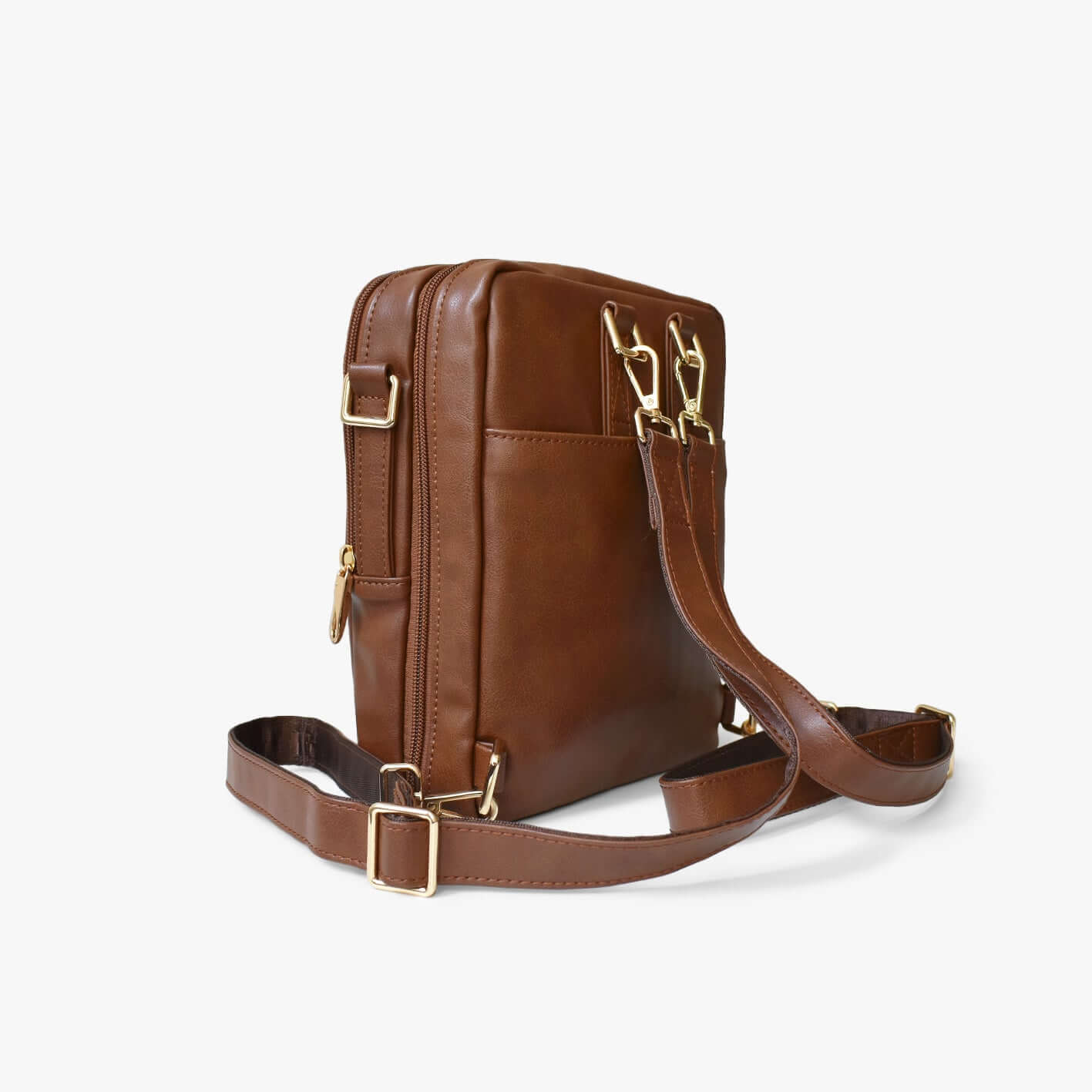 DRiiBE Holiday 4-in-1 convertible crossbody duffle bag backpack showing multiple carrying options and sleek design in neutral tones.