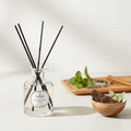 Parks Candles Inspiring Reed Diffuser 100ml in a glass bottle with natural reed sticks for home fragrance.