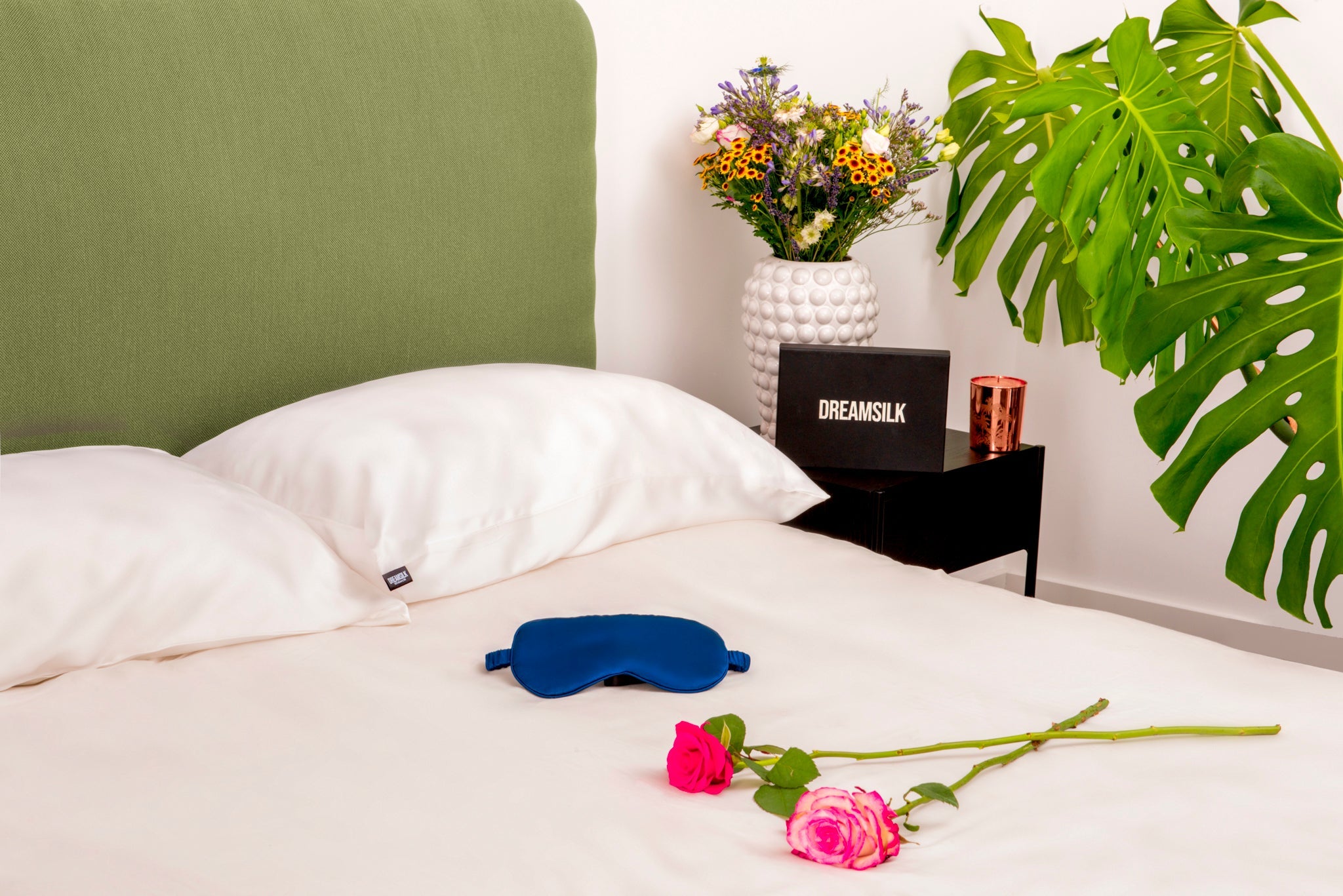 White silk pillowcase from DREAMSILK, standard size, soft and smooth fabric ideal for luxurious sleep comfort.