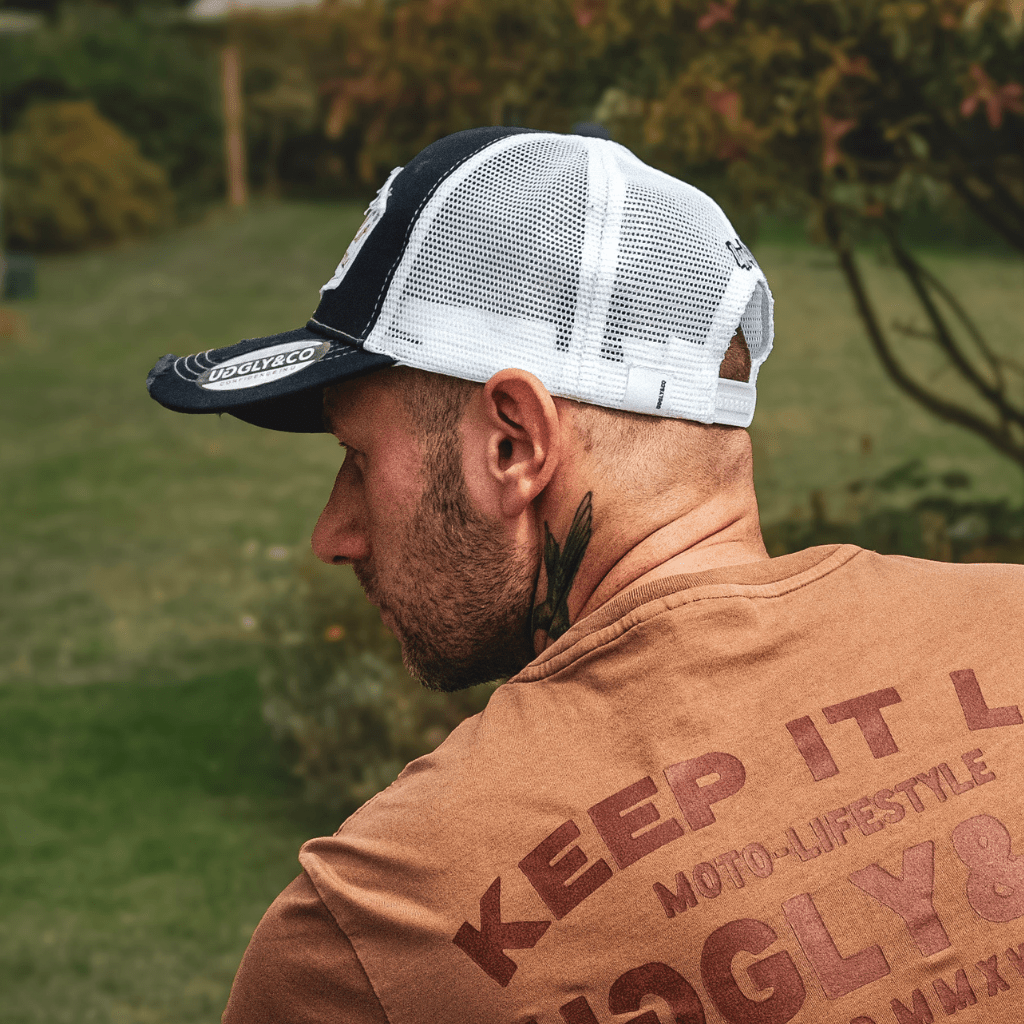Night blue and gold diamond-patterned trucker cap by Uggly and Co featuring a classic mesh back and adjustable snap closure.