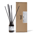 Russell + White Eastern Garden 100ml reed diffuser with decorative glass bottle and natural reed sticks for home fragrance.
