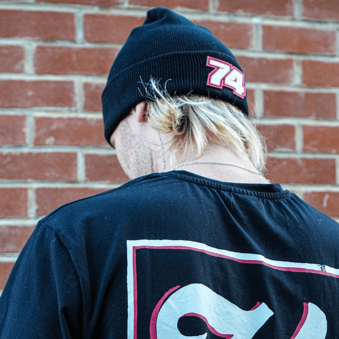 Uggly and Co Davey Todd 74 beanie in black, featuring a snug knit design and a folded brim for a casual, stylish look.