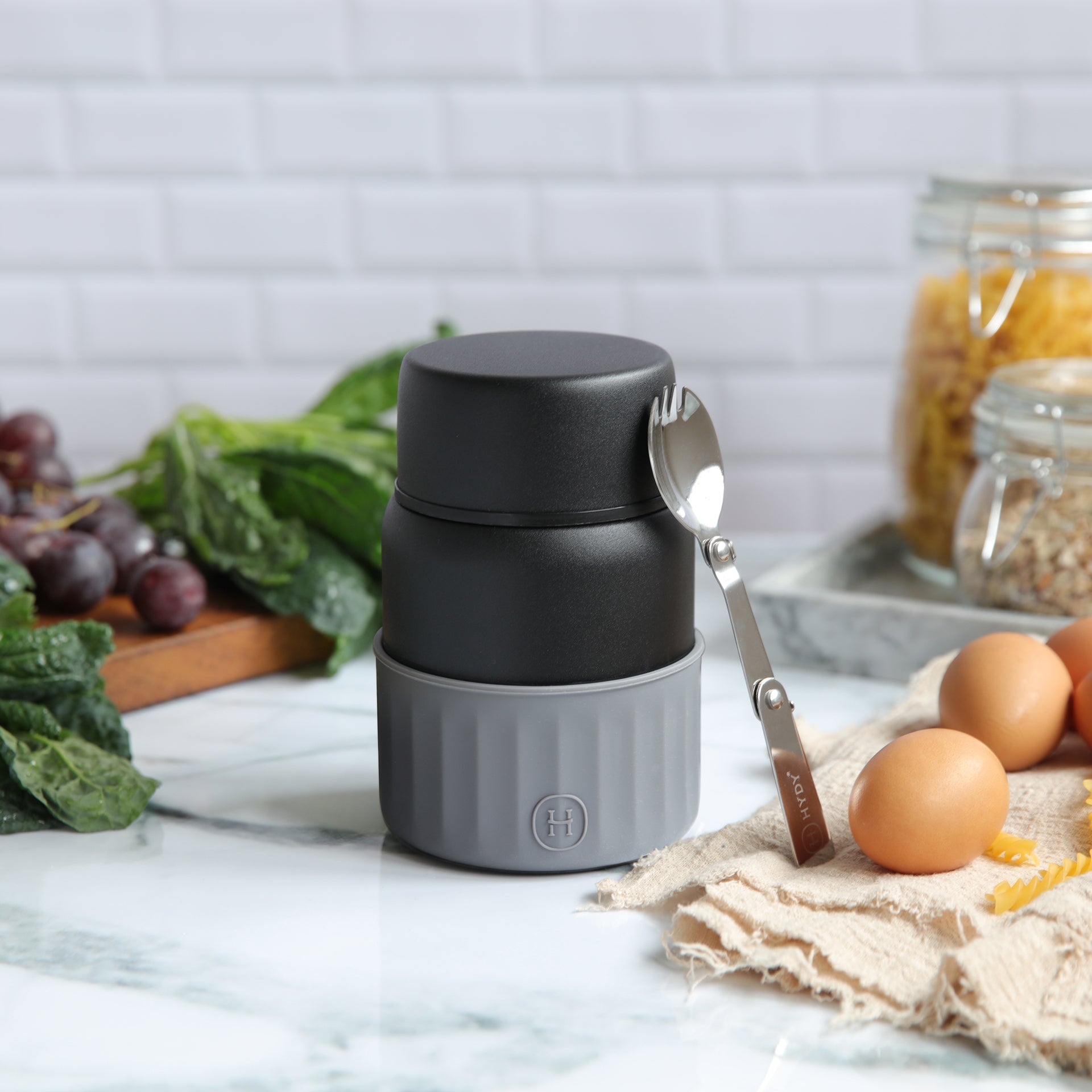 Black metallic grey 20 fl oz HYDY food jar with a sleek, insulated design and secure lid, ideal for keeping food fresh.
