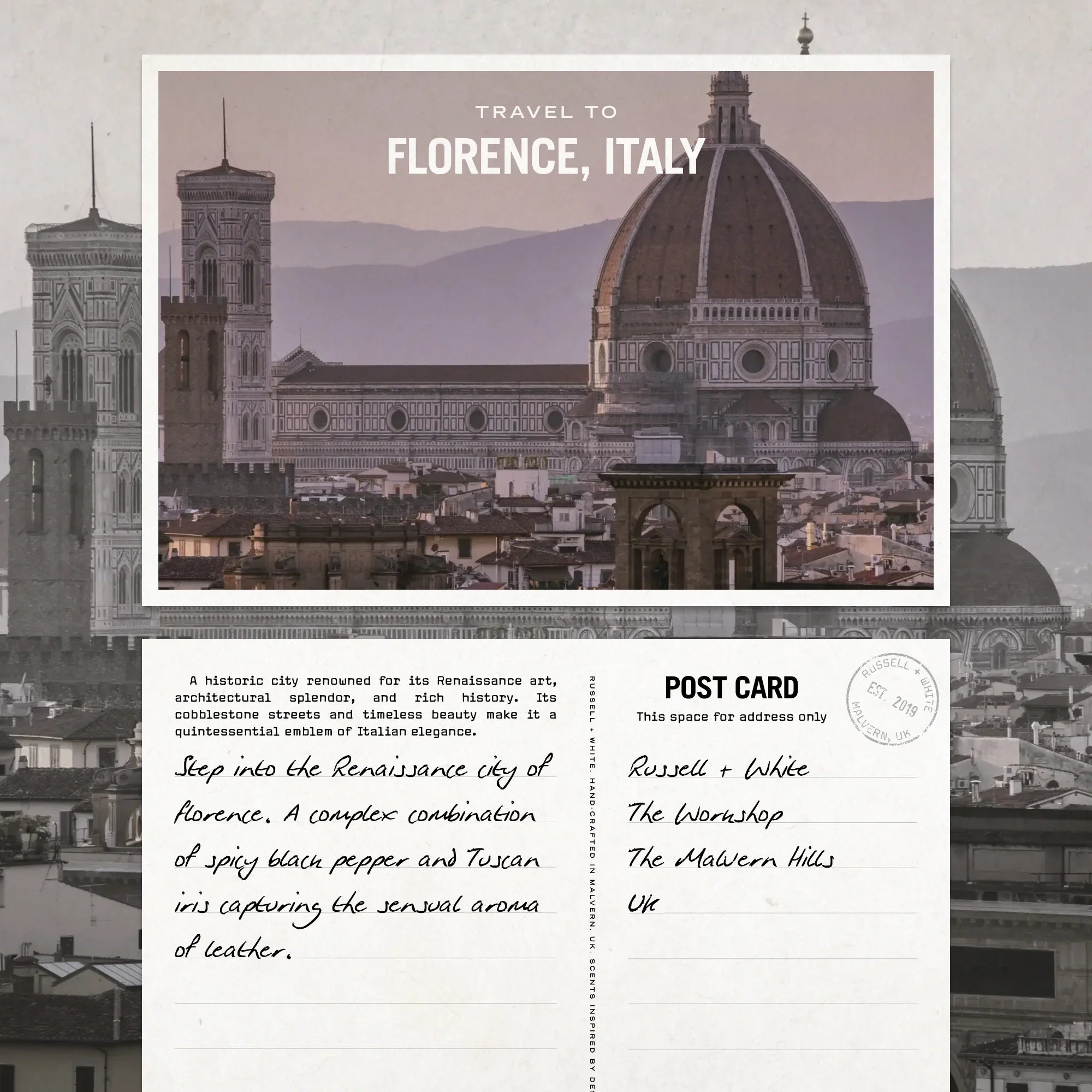Firenze Leather scented soy candle by Russell + White, featuring a beige ceramic container and a lit wick, emitting a warm glow.
