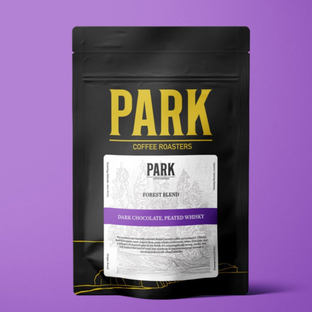 Bag of Park Coffee Forest Blend roasted coffee beans in a natural paper bag with a forest-themed label.