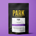 Bag of Park Coffee Forest Blend roasted coffee beans in a natural paper bag with a forest-themed label.