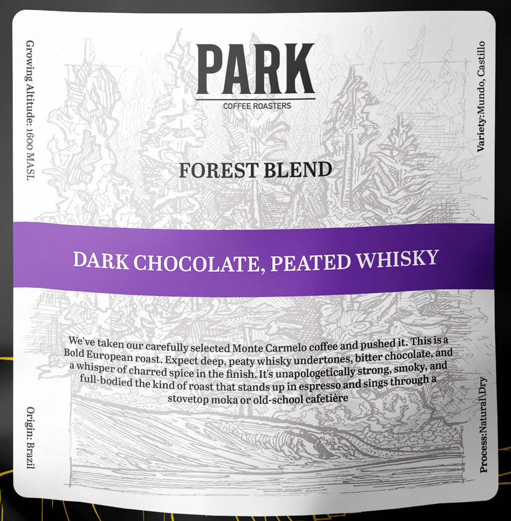 Close-up of roasted Forest Blend coffee beans from Park Coffee, showing rich brown beans with textured surface.