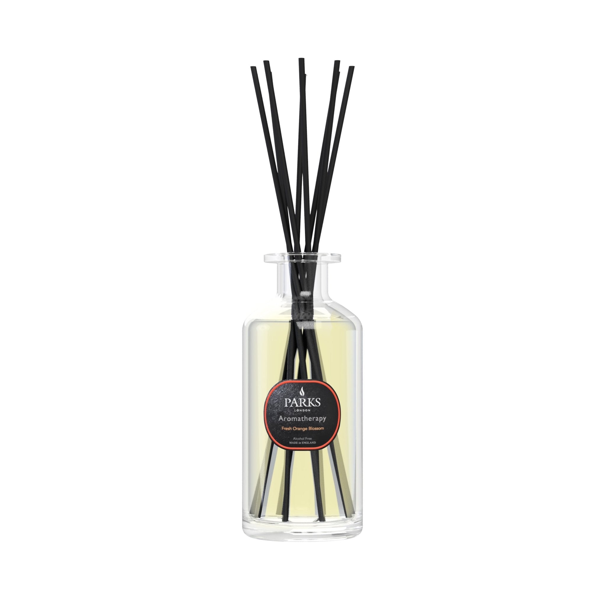 Reed diffuser with fresh orange blossom scent in a 220ml Parks Candles bottle, showcasing the diffuser sticks and floral design.