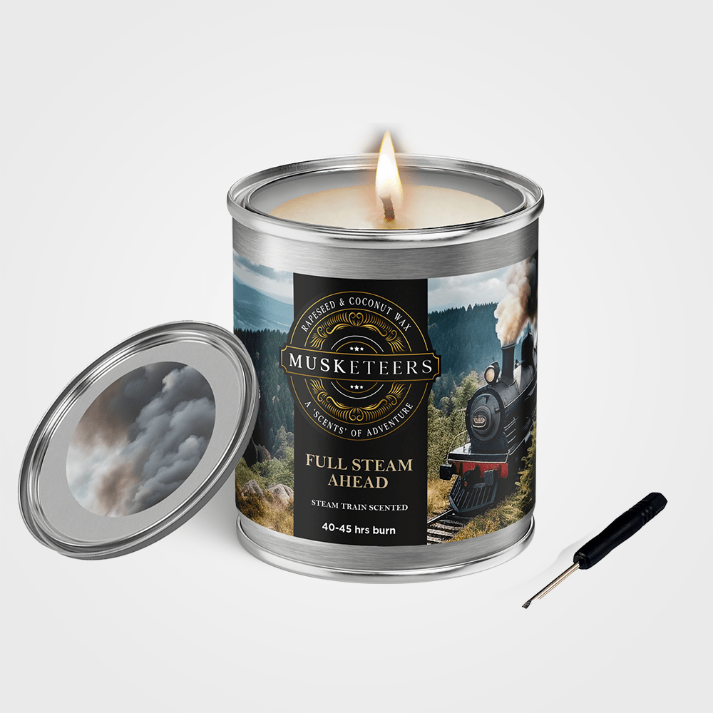 Musketeers Full Steam Ahead steam train scented masculine candle with detailed train illustration on a neutral background