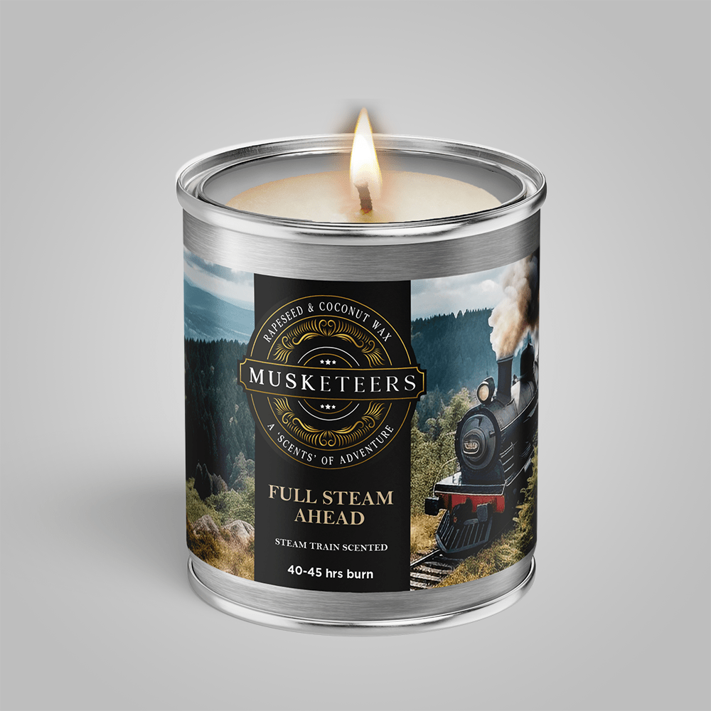 Musketeers Full Steam Ahead steam train scented masculine candle in a decorative jar, featuring a detailed train design.