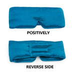 Black silk sleep mask by DREAMSILK, soft and luxurious for complete blackout and comfortable sleep.