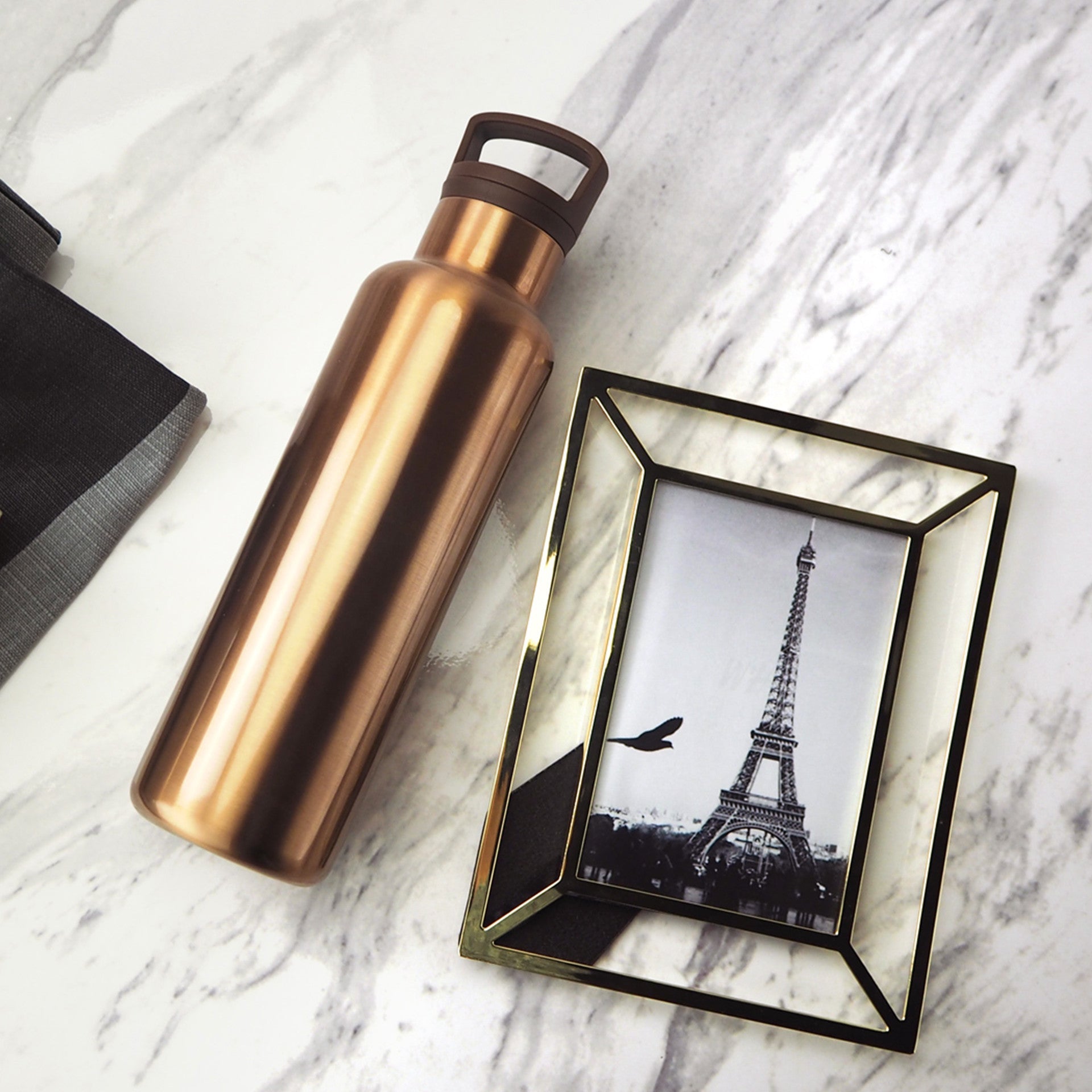 Bronze gold 20 oz HYDY bottle with a sleek metallic finish, durable design, and ergonomic shape for everyday use