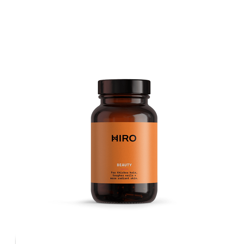 Vegan collagen beauty supplement by HIRO, featuring a sleek bottle with the product label and a clean, modern design.