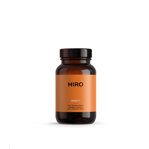 Vegan collagen beauty supplement by HIRO, featuring a sleek bottle with the product label and a clean, modern design.