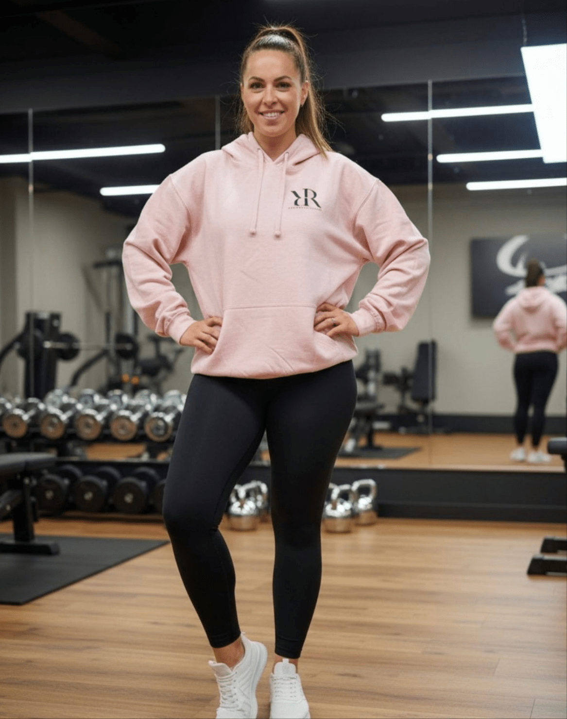 Pink Reform and Revive hoodie from the R&R clothing range with a visible logo, made for comfortable casual wear.