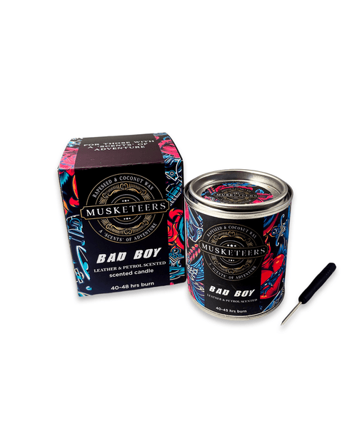 Musketeers Bad Boy Leather Candle with petrol and leather scent, masculine man cave candle, in a dark glass container.