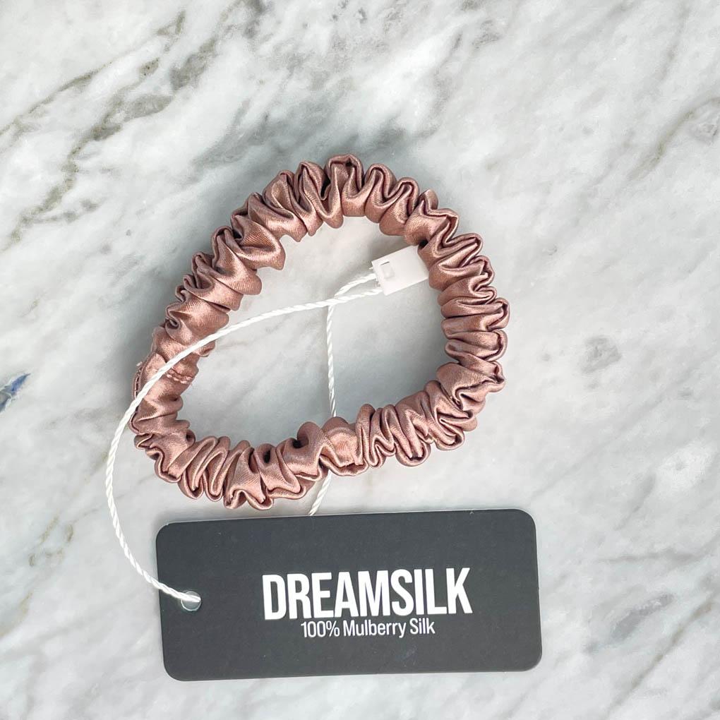 Bronze silk skinny scrunchie from DREAMSILK, soft and smooth hair accessory with a shiny silk finish.
