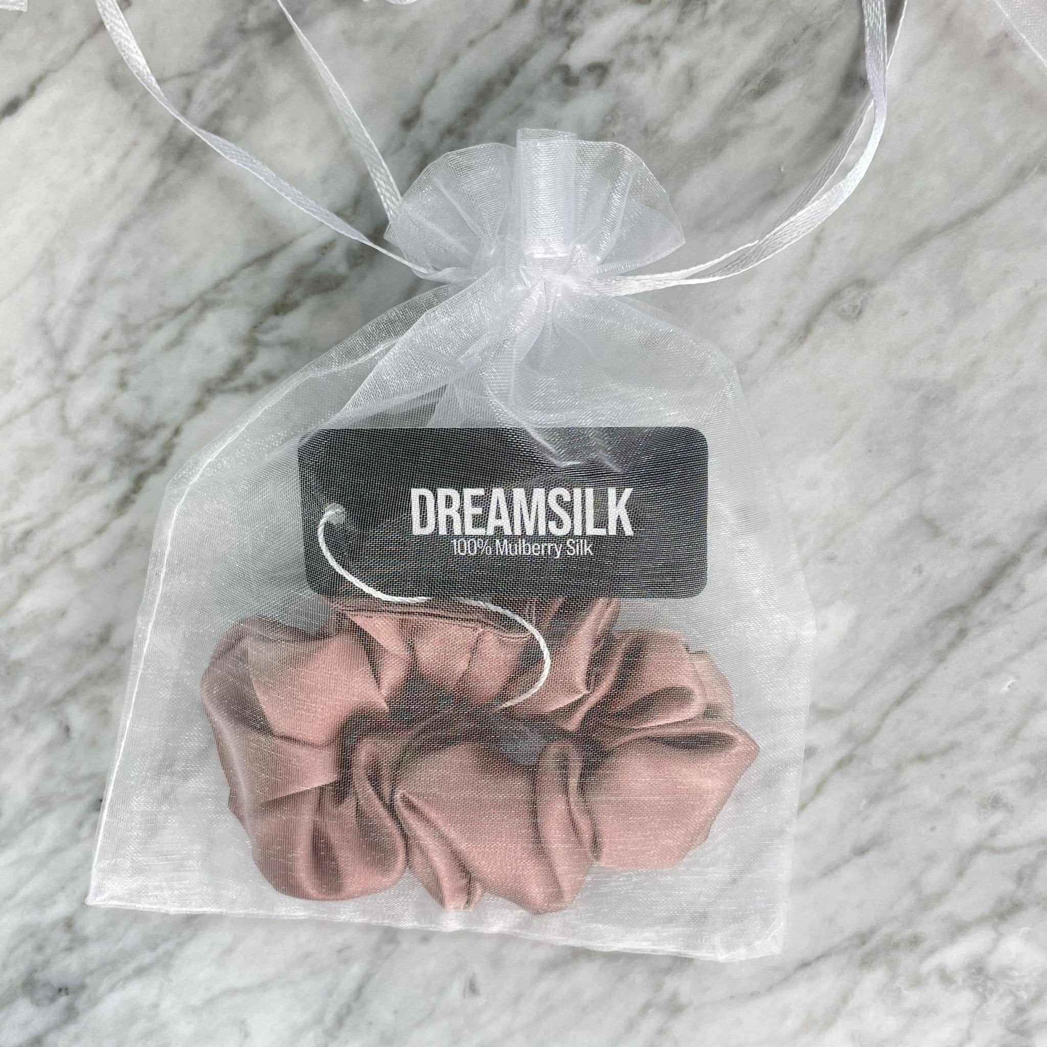 DreamSilk bronze silk scrunchie, regular size, soft and shiny fabric, shown in close-up with smooth texture and elegant appearance.