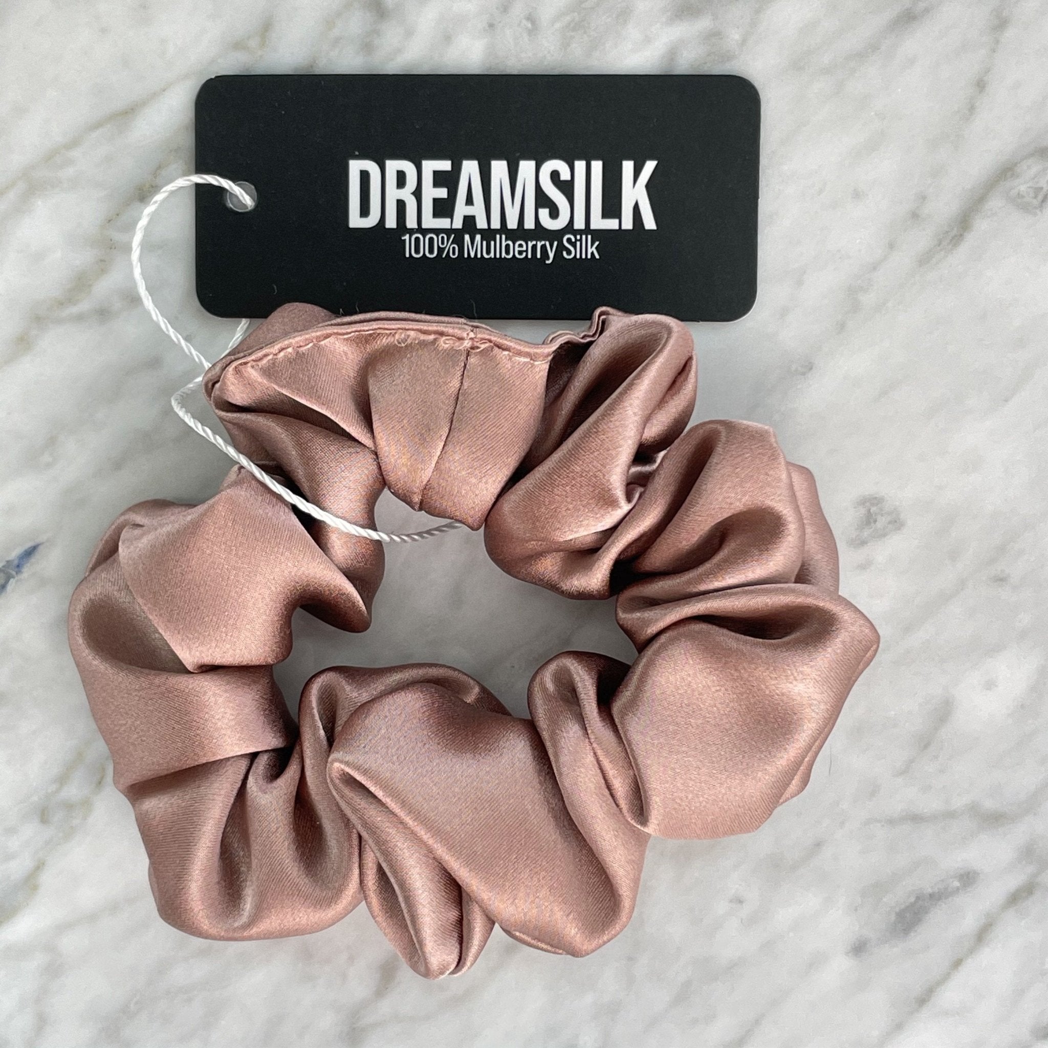 Bronze silk scrunchie from DREAMSILK, regular size, soft and smooth fabric for gentle hair styling.