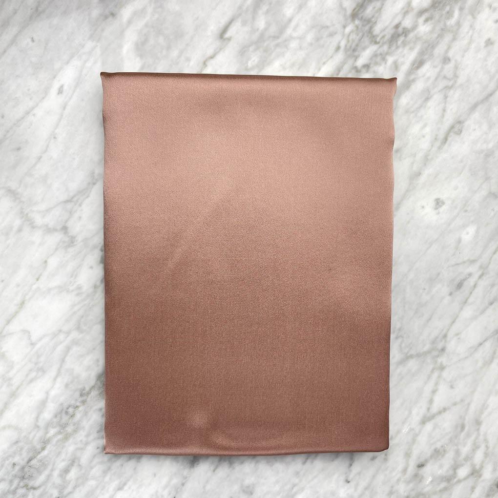 Bronze silk pillowcase from DREAMSILK, standard size, smooth and luxurious fabric, perfect for a comfortable night’s sleep.