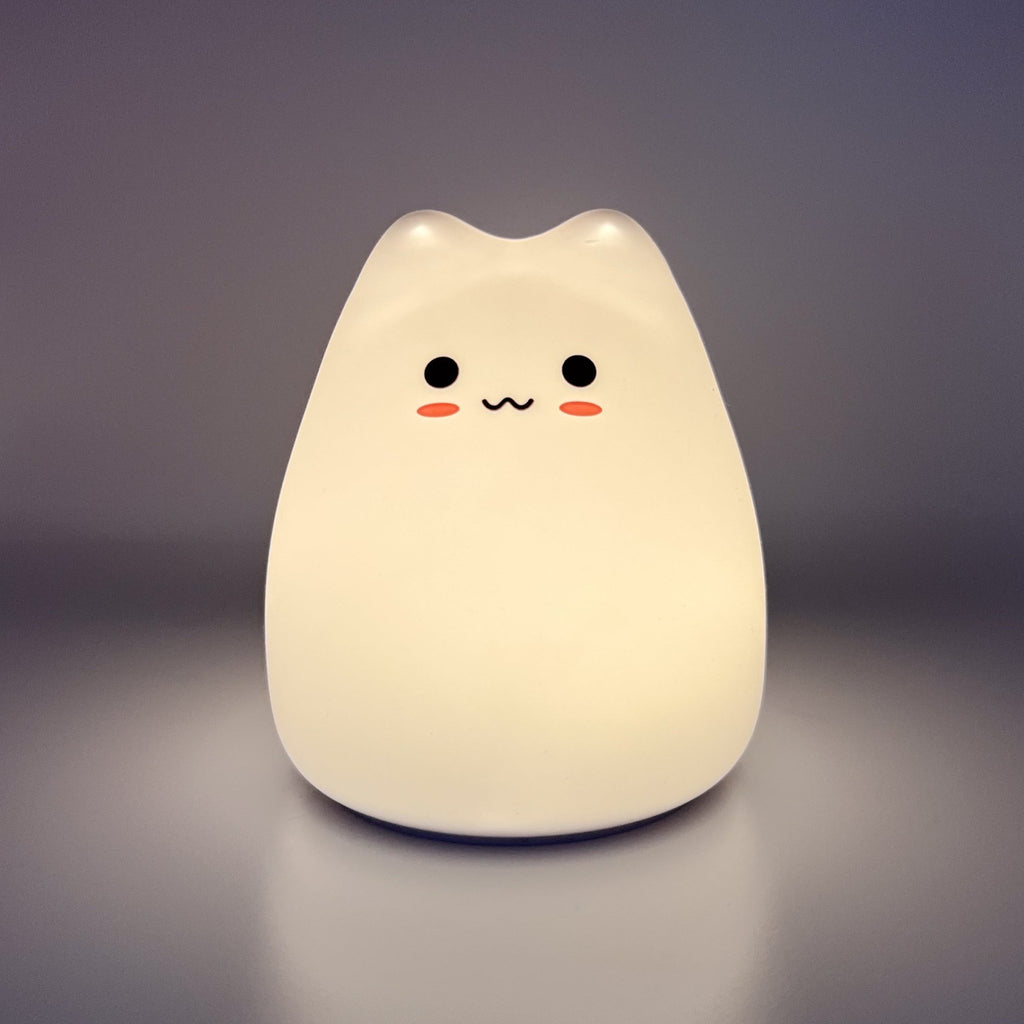 HikeWare silicone cat-shaped night light lamp emitting soft glow, designed for cozy home decor and nighttime illumination