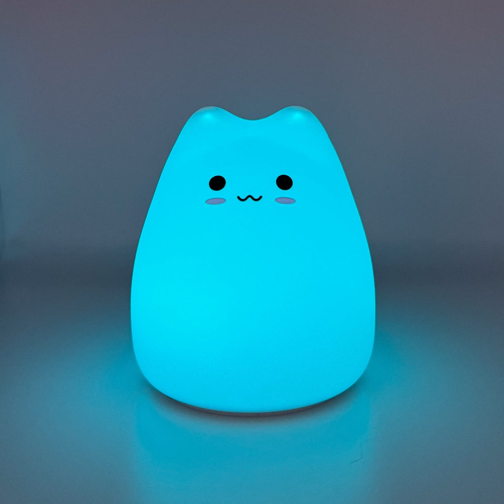 HikeWare silicone cat-shaped night light lamp with soft glow, designed for cozy bedroom or nursery lighting.