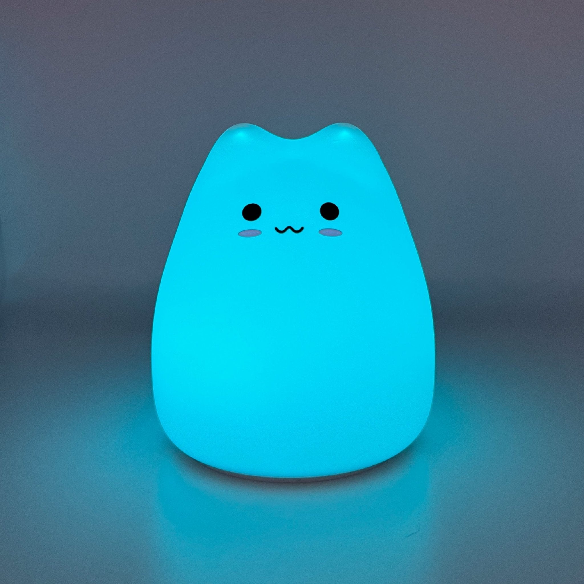 HikeWare silicone cat-shaped night light lamp with soft glow, designed for cozy bedroom or nursery lighting.